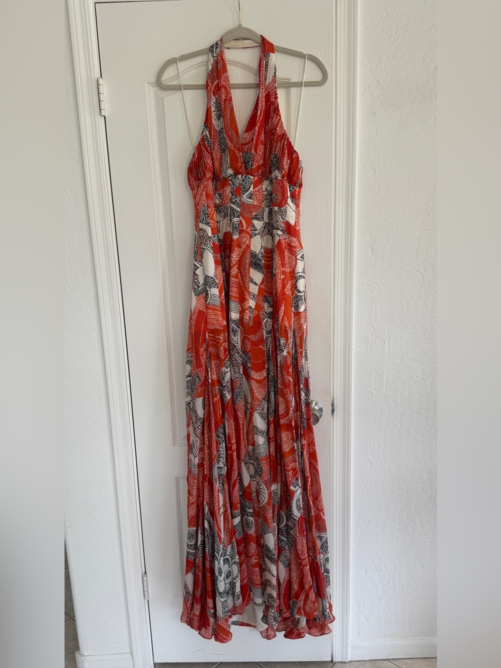 Carmen Marc Valvo Halter flowy maxi dress in orange and cream pattern